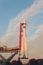 Space rocket ready to go at the start bed with blue cloudy sky in background. Royalty Free Stock Photo