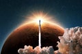 Space rocket with smoke and blast successfully launching to the red planet mars with sun rays. New spaceship lift off into starry Royalty Free Stock Photo