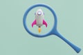 Space rocket under a magnifying glass. Royalty Free Stock Photo