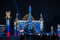 Space ship rocket Vostok and Cosmos Pavilion of VDNH (VDNKh) in Moscow in lighting effect decoration in night