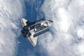 Space shuttle flies in the upper atmosphere. Elements of this image were furnished by NASA Royalty Free Stock Photo