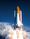 Space Shuttle Launch In The Clouds Royalty Free Stock Photo