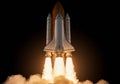 A space shuttle launches into the night sky, powered by three Royalty Free Stock Photo