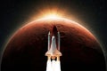 Space shuttle rocket with blast takes off to the red planet mars with dawn rays light. Successful launch of the spacecraft. Space Royalty Free Stock Photo