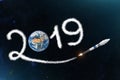 Space shuttle rocket in leaves a trail 2019 to the planet Earth. The concept of a scientific New Year in the World - Asia, Europe