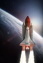 Space shuttle rocket in oe Earth planet. Deep space and sun on background. Royalty Free Stock Photo