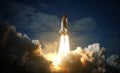 Space Shuttle takes off into space. Elements of this image furnished by NASA Royalty Free Stock Photo