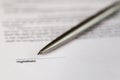 Space for signature on document and silver pen Royalty Free Stock Photo