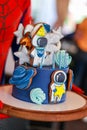 Space style kids cake with gingerbread figures Royalty Free Stock Photo