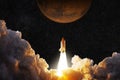 Spacecraft takes off into space. Rocket flies to Mars. Royalty Free Stock Photo