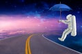 Spaceman lands on an umbrella on the space route