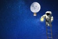 Spaceman and moon light in outer space Royalty Free Stock Photo