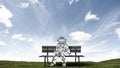 Rocketman on bench. Mixed media Royalty Free Stock Photo