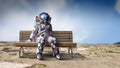 Rocketman on bench. Mixed media Royalty Free Stock Photo