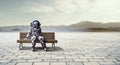 Rocketman on bench. Mixed media Royalty Free Stock Photo