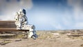 Rocketman on bench. Mixed media Royalty Free Stock Photo