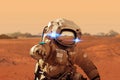 Spaceman walks on the red planet Mars. Space Mission. Royalty Free Stock Photo