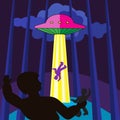 The spaceship abducts a person at night in the woods