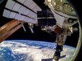 spaceship next to the earth view from a Spacecraft. Elements of this image furnished by NASA Royalty Free Stock Photo