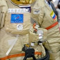 The spacesuit of a Russian cosmonaut from the ISS space station. Roscosmos inscription on the astronaut`s clothing - Moscow,