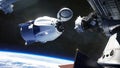 SpaceX Crew Dragon spacecraft docking to the International Space Station. Royalty Free Stock Photo