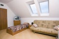 Spacious attic bedroom Royalty Free Stock Photo