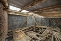 Spacious attic room under construction and renovation. Energy saving walls of large hollow foam insulation blocks and temporary