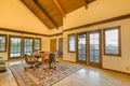 Spacious bonus room with two decks and beamed wooden ceiling