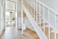 A spacious bright corridor with the stairs