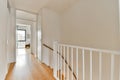 A spacious bright corridor with the stairs