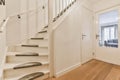 Spacious corridor with a side staircase