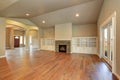 Spacious empty living room interior with vaulted ceiling