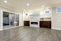 Spacious empty living room interior in white and gray colors.