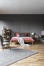 Spacious grey bedroom interior Royalty Free Stock Photo
