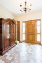 Spacious hallway with wooden wardrobe Royalty Free Stock Photo