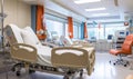 A Spacious Hospital Room with Multiple Beds and Comfortable Seating Royalty Free Stock Photo