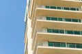 Spacious hotel balconies in resort town with blue sky