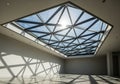 Spacious interior with a large glass skylight featuring a geometric, Royalty Free Stock Photo