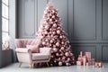 Spacious modern gray room with pink Christmas tree decorated with trendy pink decorations and gifts Royalty Free Stock Photo