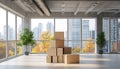 Spacious modern office interior with cardboard boxes and large windows. concept of office moving, workspace transition Royalty Free Stock Photo