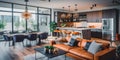 Spacious and modern open-concept living area with a gourmet kitchen, dining space, and comfortable seating. Royalty Free Stock Photo