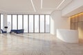 Spacious reception area with city views and contemporary design, modern office interior. Royalty Free Stock Photo