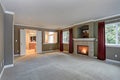 Spacious red and gray living room with high ceiling Royalty Free Stock Photo