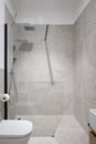 Spacious shower in bathroom with modern patterned tiles Royalty Free Stock Photo