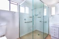 Spacious shower cabin with handles