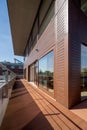 Spacious wooden balcony around house