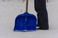 Spade. man removes snow shovel. winter snow