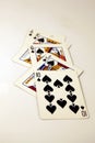 Spades royal flush poker hand in black