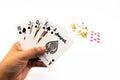 Spades royal straight flush of poker card game in the hand of ma Royalty Free Stock Photo