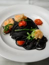 Spaghetti al Nero di Seppia with Squid Ink and Prawns Royalty Free Stock Photo